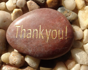 rock with Thank You on it